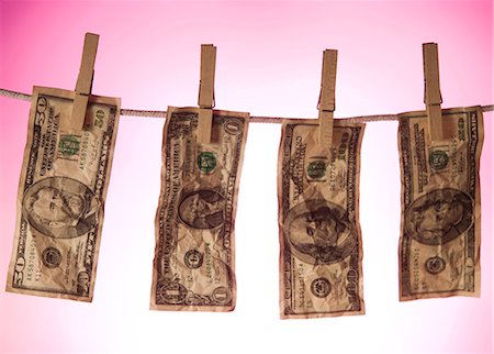 simsearch:640-02656364,k - Banknotes on clothesline Stock Photo - Premium Royalty-Free, Code: 640-03259658