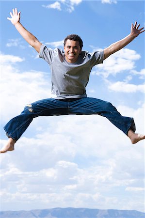 enthused - Man jumping Stock Photo - Premium Royalty-Free, Code: 640-03259798