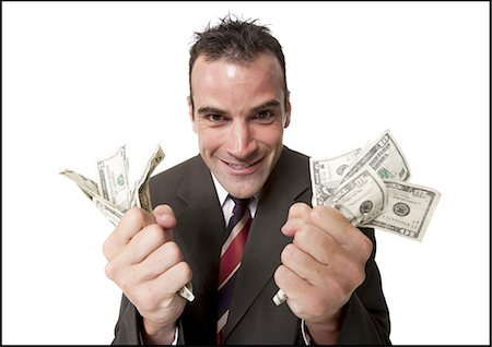 simsearch:640-03260699,k - Businessman grasping money in both hands Foto de stock - Sin royalties Premium, Código: 640-03259875