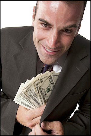 simsearch:640-03260034,k - Businessman grasping money in both hands Foto de stock - Royalty Free Premium, Número: 640-03259876