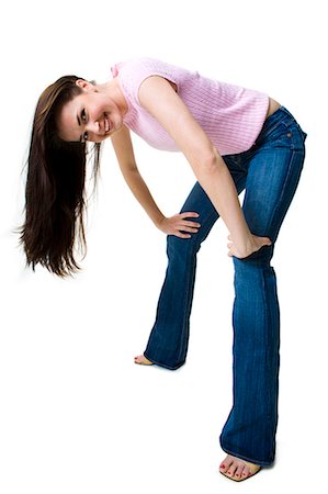 silhouette of teenage girl - Teenage girl bending over Stock Photo - Premium Royalty-Free, Code: 640-03259939