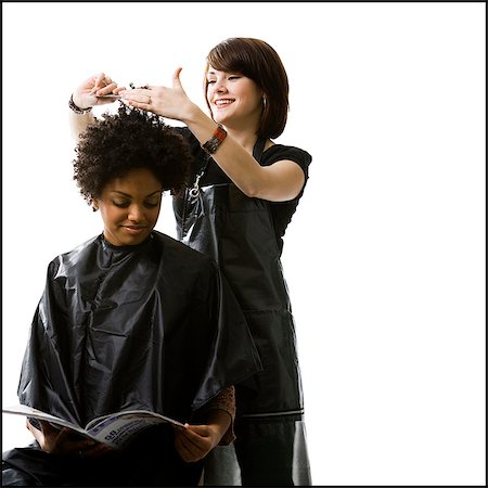 female hair stylist with apron - Female hairdresser cutting hair Foto de stock - Sin royalties Premium, Código: 640-03264063