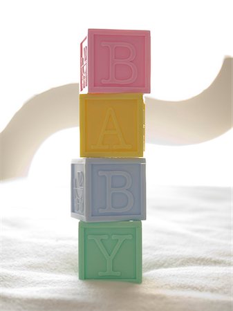 educational toys - Blocks spelling out baby Stock Photo - Premium Royalty-Free, Code: 640-03264078