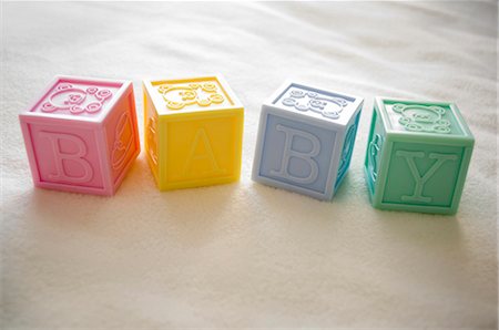 educational toys - Blocks spelling out baby Stock Photo - Premium Royalty-Free, Code: 640-03264073