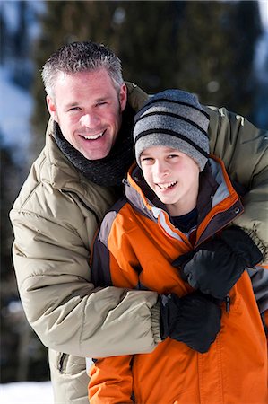family traveling with teens - Father and son outside Stock Photo - Premium Royalty-Free, Code: 640-03264179