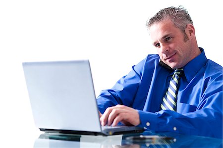 simsearch:614-02680155,k - Man on a laptop Stock Photo - Premium Royalty-Free, Code: 640-03264171