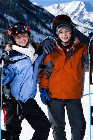 simsearch:640-03264354,k - A brother and sister with snowboards outside Stock Photo - Premium Royalty-Free, Code: 640-03264193