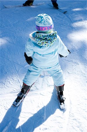 skiing top view - Young girl learning to ski Stock Photo - Premium Royalty-Free, Code: 640-03264240