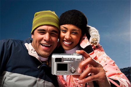 simsearch:640-03264284,k - Couple using a camera outside Stock Photo - Premium Royalty-Free, Code: 640-03264289