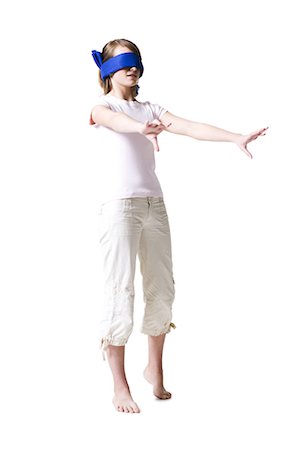 Blindfolded teenager with arms extended Stock Photo - Premium Royalty-Free, Code: 640-03264894
