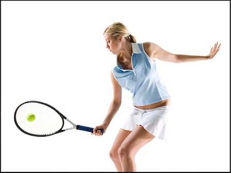 Tennis player hitting ball Stock Photo - Premium Royalty-Free, Code: 640-03264931