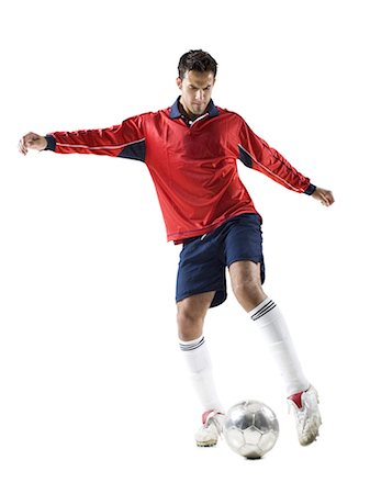 someone kicking a soccer ball silhouette - Soccer player kicking ball Foto de stock - Sin royalties Premium, Código: 640-03264984