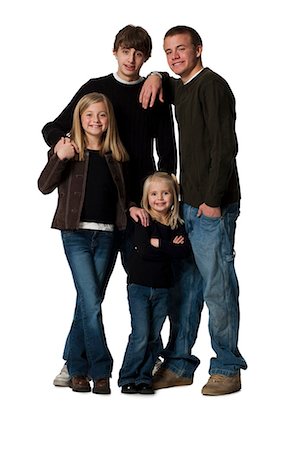 seis - Family posing for portrait Foto de stock - Sin royalties Premium, Código: 640-03265095