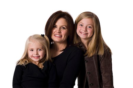 simsearch:640-03265356,k - Mother posing with young daughters Stock Photo - Premium Royalty-Free, Code: 640-03265092