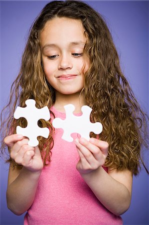 puzzles - Young girl holding cookie jar Foto de stock - Sin royalties Premium, Código: 640-03265213