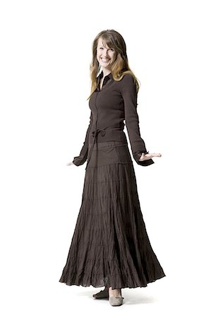 full body cutout middle aged casual - Portrait of a woman smiling Stock Photo - Premium Royalty-Free, Code: 640-03265248