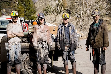 Group of four miners Foto de stock - Sin royalties Premium, Código: 640-03265272