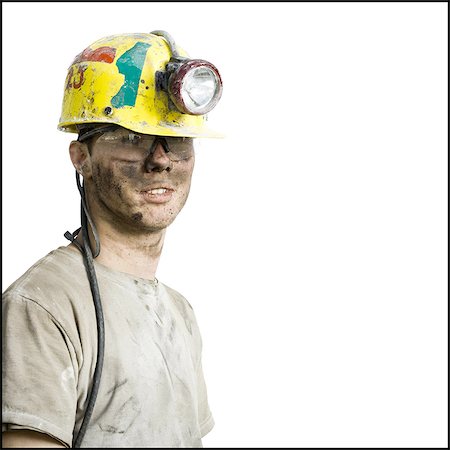 dirt worker - Miner with flashlight helmet Stock Photo - Premium Royalty-Free, Code: 640-03265273