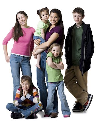 Mother posing with son and daughters Stock Photo - Premium Royalty-Free, Code: 640-03265311