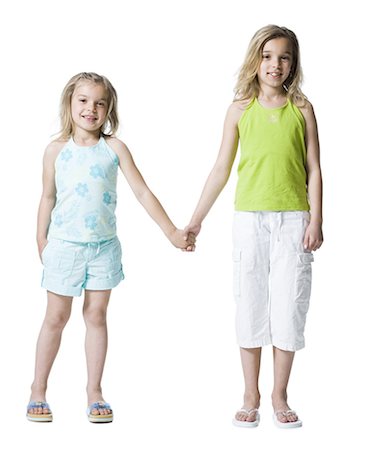 simsearch:640-03265356,k - Young sisters posing Stock Photo - Premium Royalty-Free, Code: 640-03265354