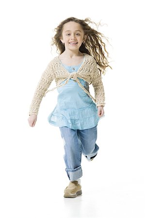 run white background - Portrait of a girl running Foto de stock - Sin royalties Premium, Código: 640-03265401