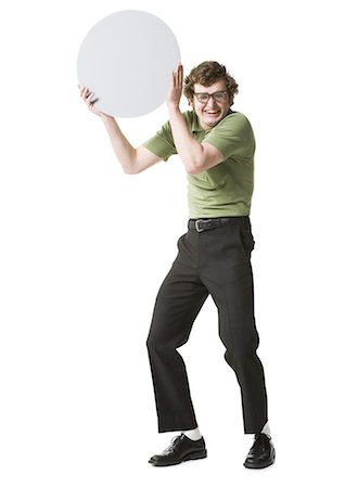 Nerdy guy holding blank sign Stock Photo - Premium Royalty-Free, Code: 640-03265776