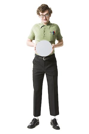 exaggerating - Nerdy guy holding blank sign Stock Photo - Premium Royalty-Free, Code: 640-03265777