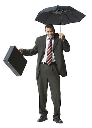 simsearch:640-03260034,k - Businessman holding an umbrella and briefcase Foto de stock - Royalty Free Premium, Número: 640-03260040