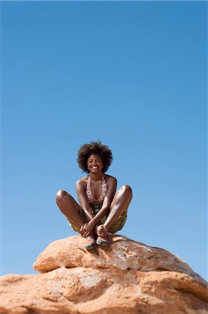 simsearch:640-03260223,k - Woman on large boulder Stock Photo - Premium Royalty-Free, Code: 640-03260087