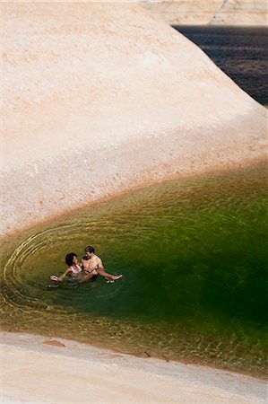 Couple together in the water Stock Photo - Premium Royalty-Free, Code: 640-03260091