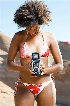 spiegelreflexkamera - Caméra tenue de femme Photographie de stock - Premium Libres de Droits, Code: 640-03260115