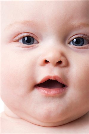 sad face kid - Baby face close-up Stock Photo - Premium Royalty-Free, Code: 640-03260143