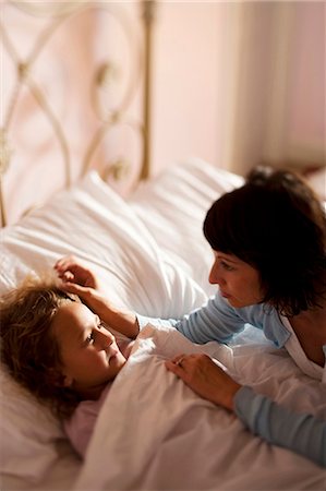 sick girl in bed - Mother with sick child Stock Photo - Premium Royalty-Free, Code: 640-03260187