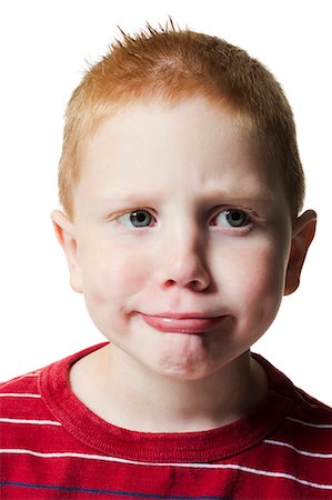 funny faces kids - Boy pulling funny face Stock Photo - Premium Royalty-Free, Code: 640-03260421