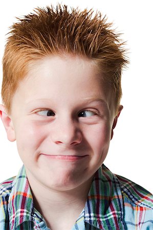 simsearch:640-03258417,k - Boy pulling funny face Stock Photo - Premium Royalty-Free, Code: 640-03260434