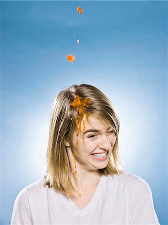 woman getting jello dumped on her head Stock Photo - Premium Royalty-Free, Code: 640-03260430