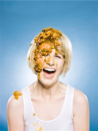 slime - woman getting food dumped on her head Stock Photo - Premium Royalty-Free, Code: 640-03260468
