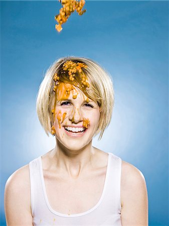 slime - woman getting food dumped on her head Stock Photo - Premium Royalty-Free, Code: 640-03260469