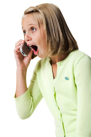 Girl talking on cell phone Stock Photo - Premium Royalty-Free, Code: 640-03260494