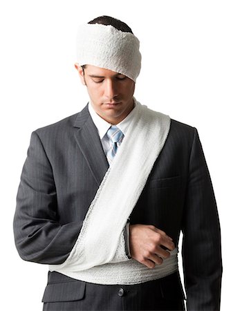 businessman with bandages on Foto de stock - Sin royalties Premium, Código: 640-03260501