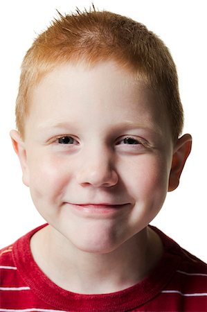 funny faces kids - Boy pulling funny face Stock Photo - Premium Royalty-Free, Code: 640-03260550