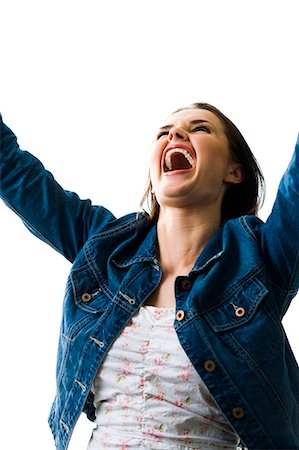 reaching sky - Smiling woman with raised arms Stock Photo - Premium Royalty-Free, Code: 640-03260562