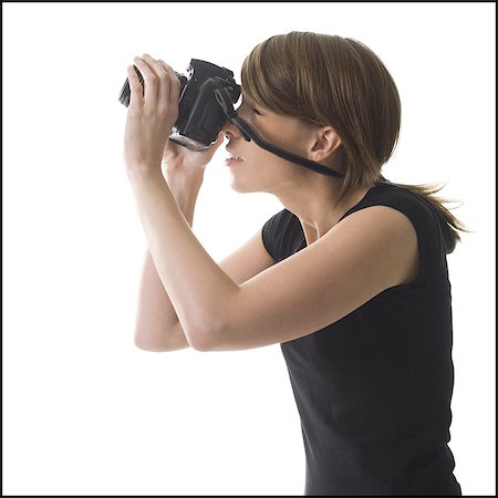 Teenage girl with a camera Stock Photo - Premium Royalty-Free, Code: 640-03260579