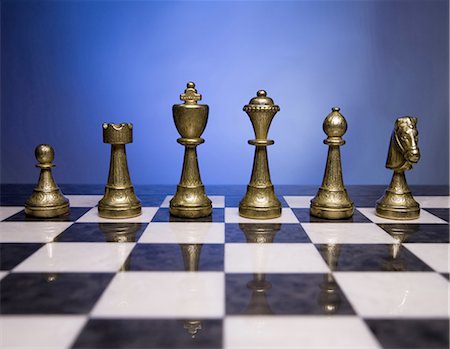 Chess board and chess pieces Stock Photo - Premium Royalty-Free, Code: 640-03260645