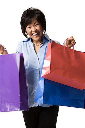 simsearch:640-03261552,k - Woman holding shopping bags Stock Photo - Premium Royalty-Free, Code: 640-03260695