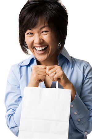 simsearch:640-03261552,k - Woman holding shopping bags Stock Photo - Premium Royalty-Free, Code: 640-03260697