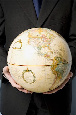 Globe holding homme Photographie de stock - Premium Libres de Droits, Code: 640-03260822
