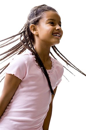 simsearch:640-03260960,k - Closeup of girl swinging braids Stock Photo - Premium Royalty-Free, Code: 640-03260945