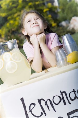 sell lemonade - Girl selling lemonade Stock Photo - Premium Royalty-Free, Code: 640-03261003