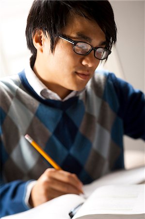 simsearch:640-03261483,k - Closeup of student studying Stock Photo - Premium Royalty-Free, Code: 640-03261134